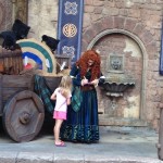Merida autographing for her little guest