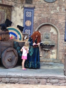 Merida autographing for her little guest